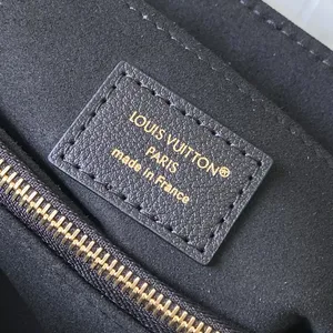 Louis Vuitton Madeleine Bag M28610